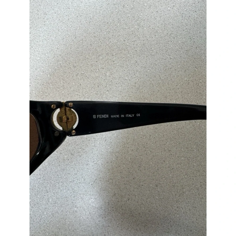 FENDI SL 7506 Oval Sunglasses Black Plastic Frame Brown Tinted Lenses Women